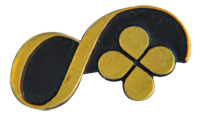 Duskin's company badge: A four-leaf clover